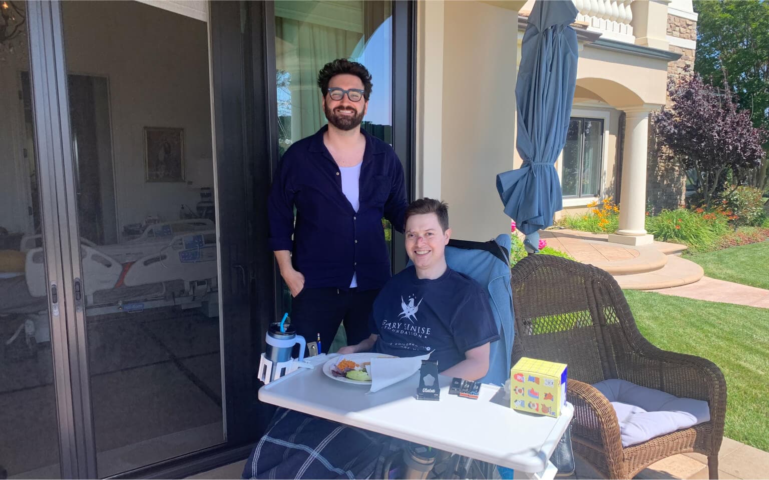 Mac with his friend Oliver during a visit to his house.