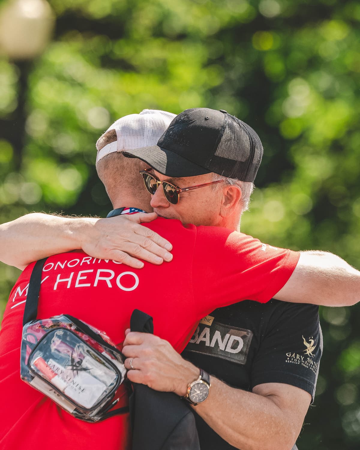 Gary hugging family member of fallen