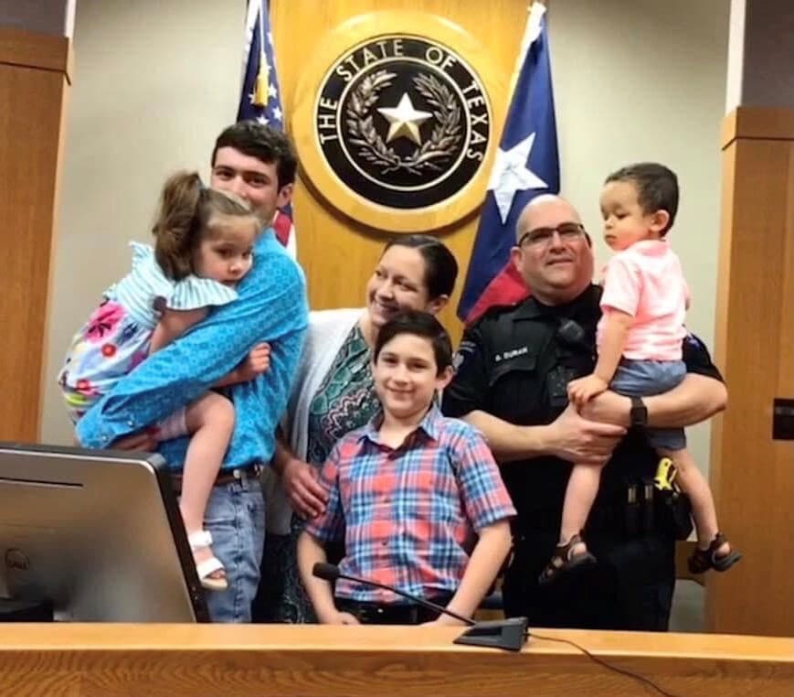 Brittany Forbes, center, with her fiancé, Gabriel Duran, surrounded by family.
