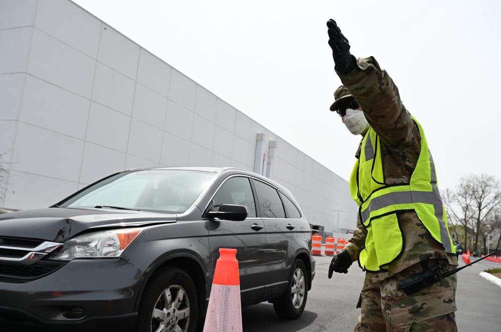 Michael Choothesa, a senior airman in the Connecticut Air National Guard, at a COVID-19 testing site in New Haven. Photo credit, Ryan Caron King/Connecticut Public